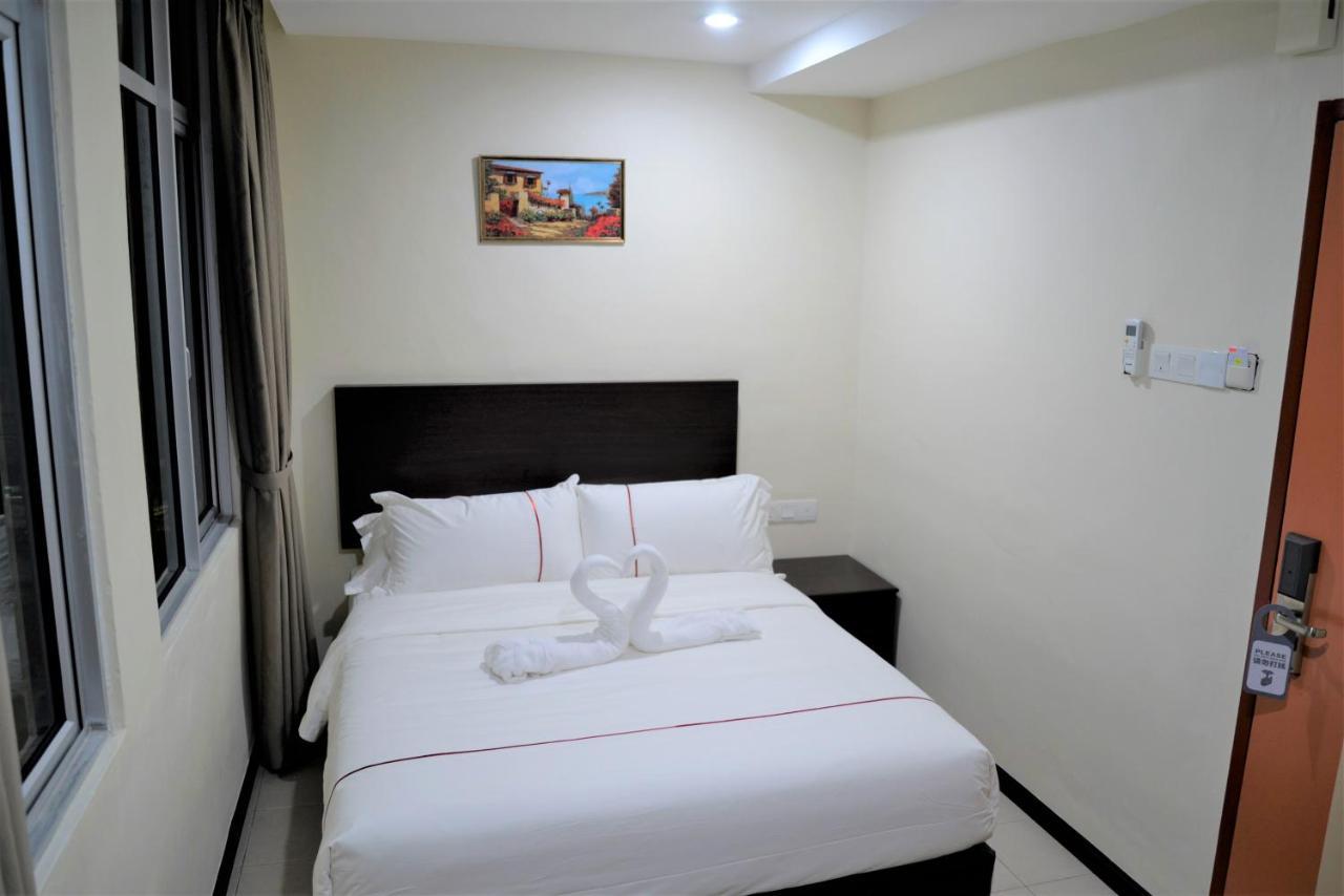 Dcozy Hotel Perai Exterior photo